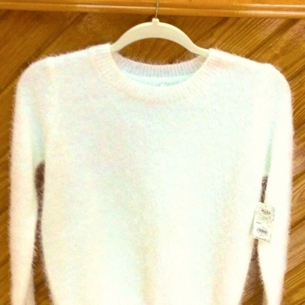 - Brand new fuzzy cream colored sweater